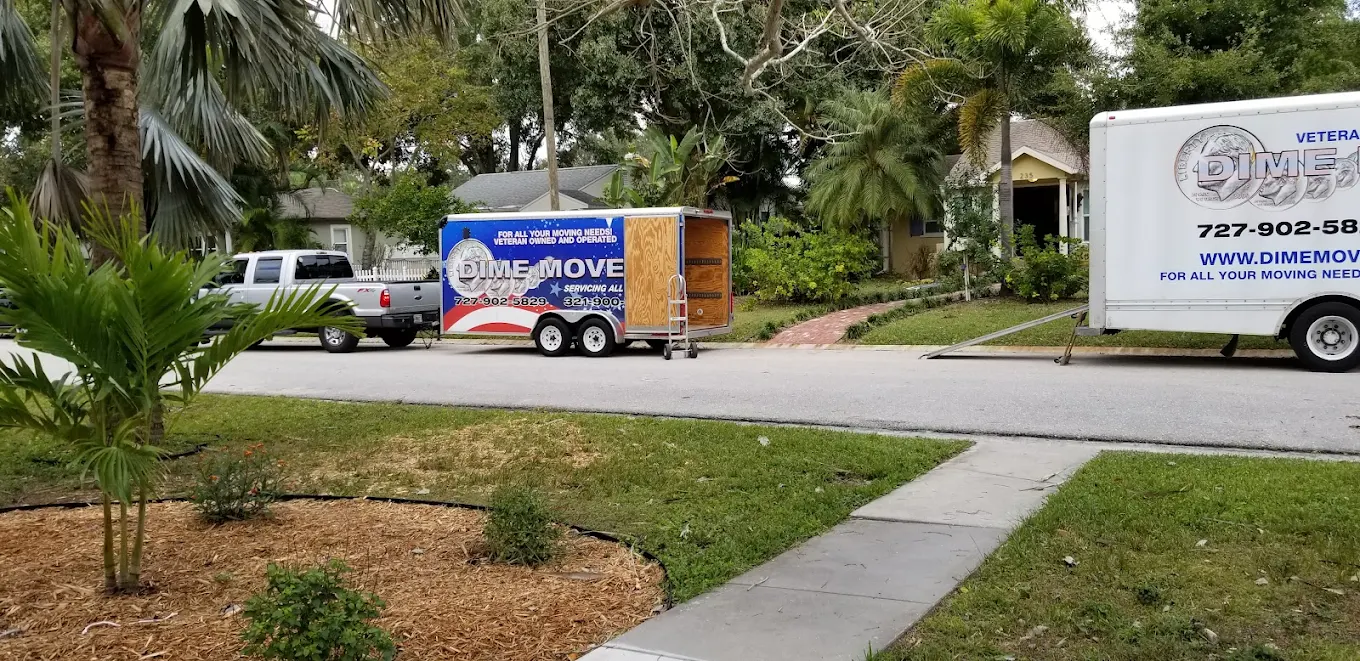Dime Movers truck in front of a Florida home
